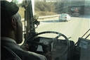 A bus operator driving safely and avoiding distractions to keep his attention on driving